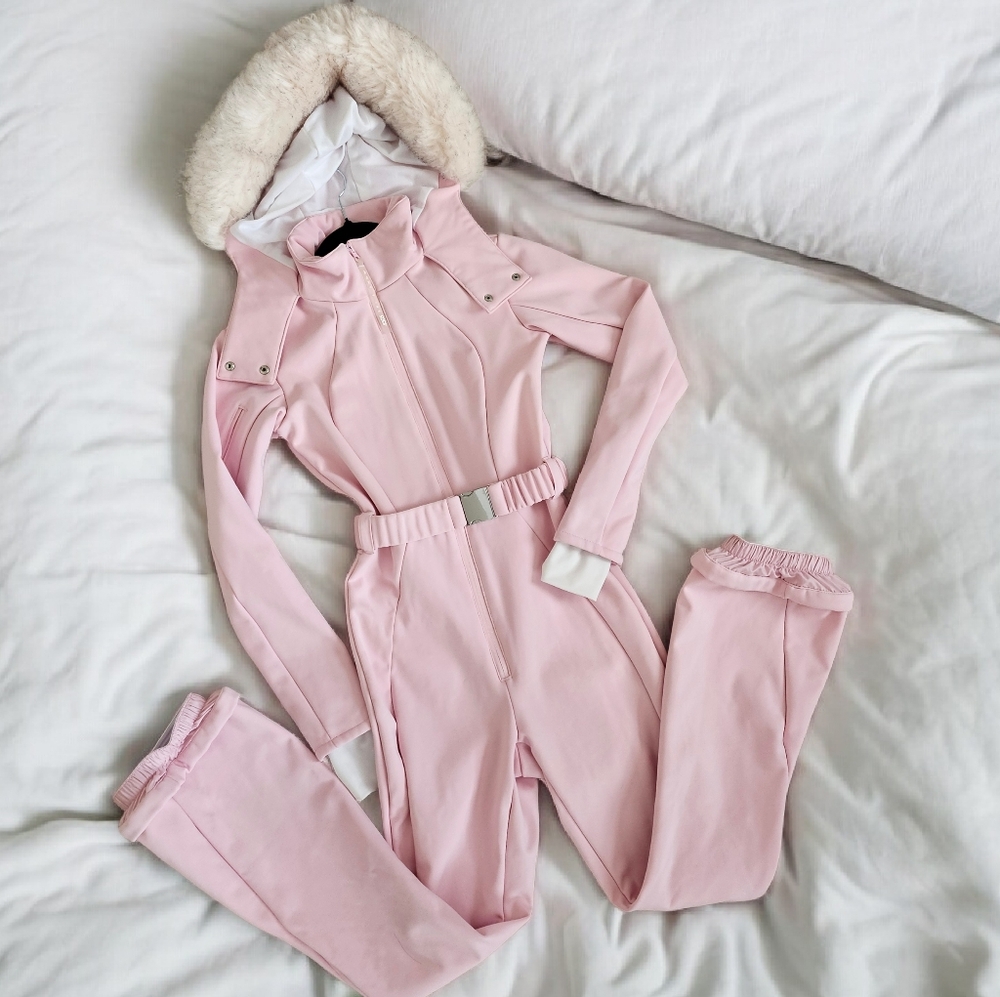 4505 Ski belted ski suit with slim kick leg and faux fur hood in Pink